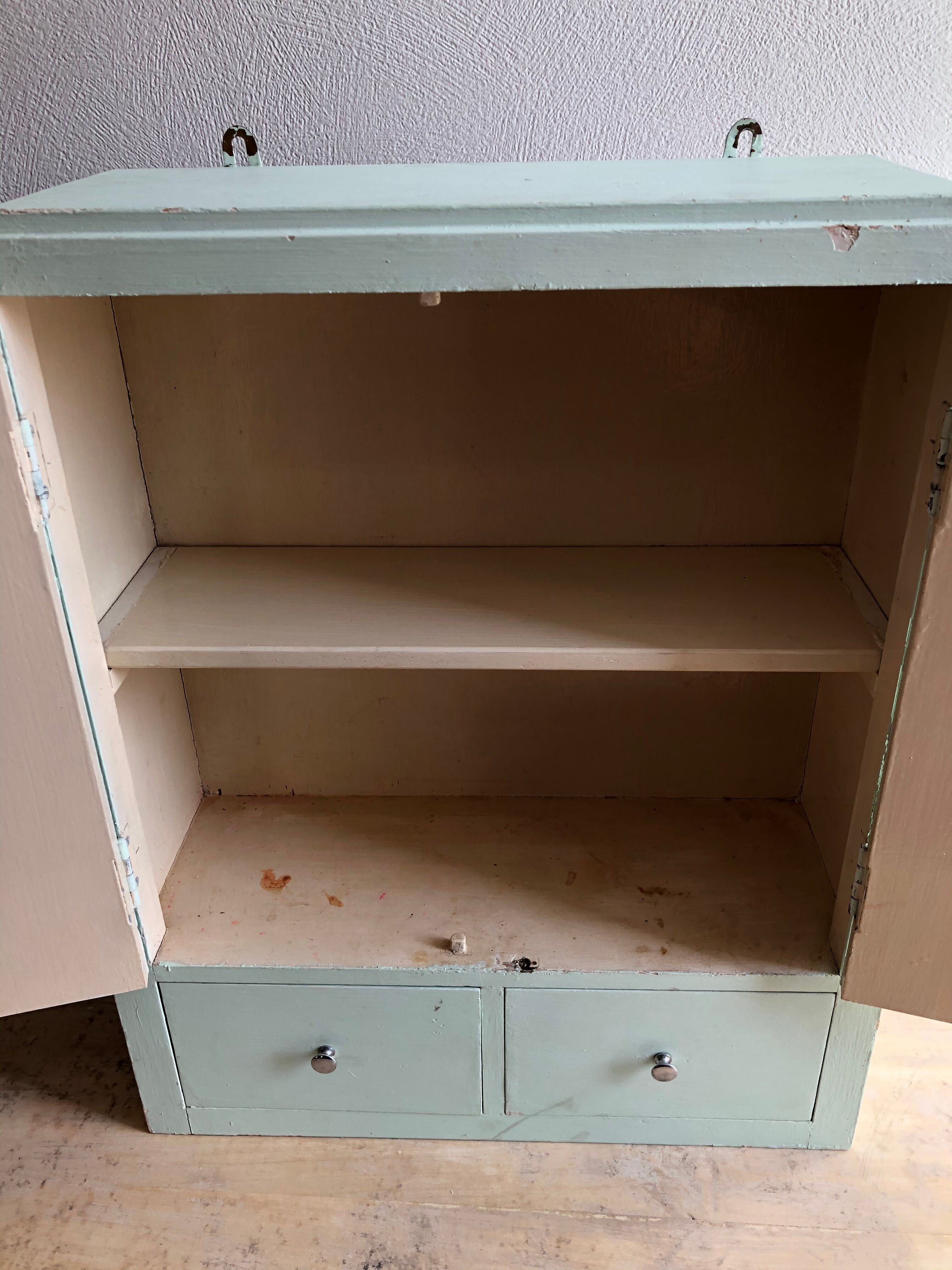 Patinated medicine cabinet