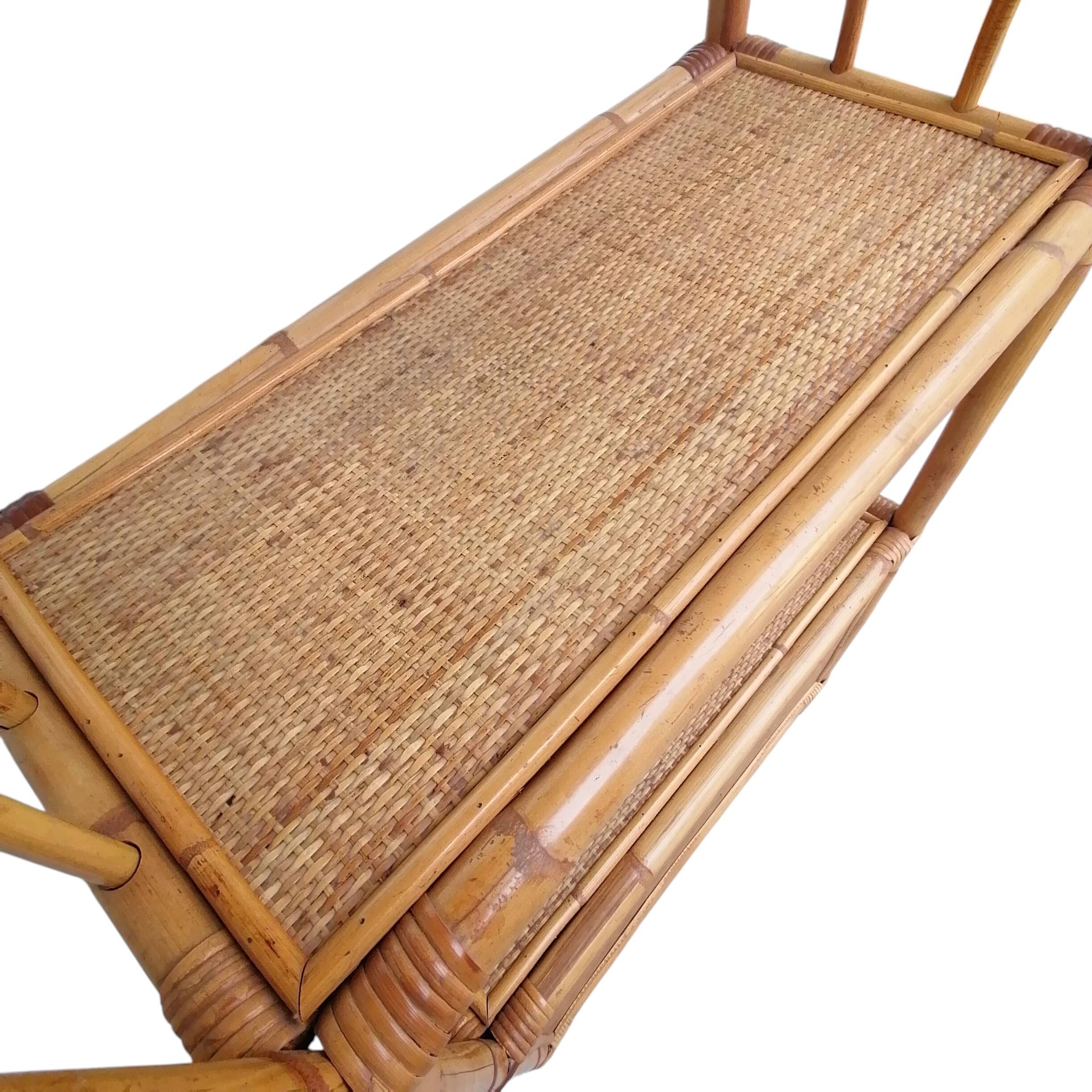Bamboo and wicker bookshelf, vintage boho-chic from the '70s.