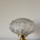 Brass lamp with molded glass globe