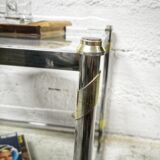Square coffee table in chrome and gold metal