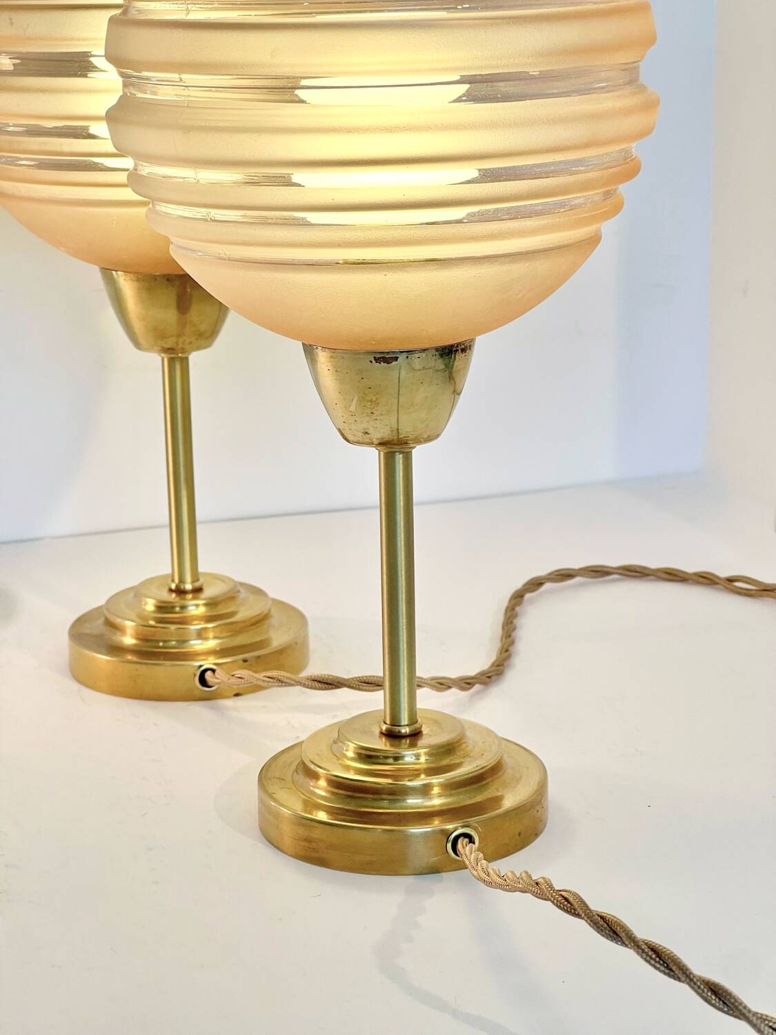 Pair of Art Deco bedside lamps in brass and etched glass