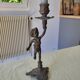 Pewter gray cherub candle holder.