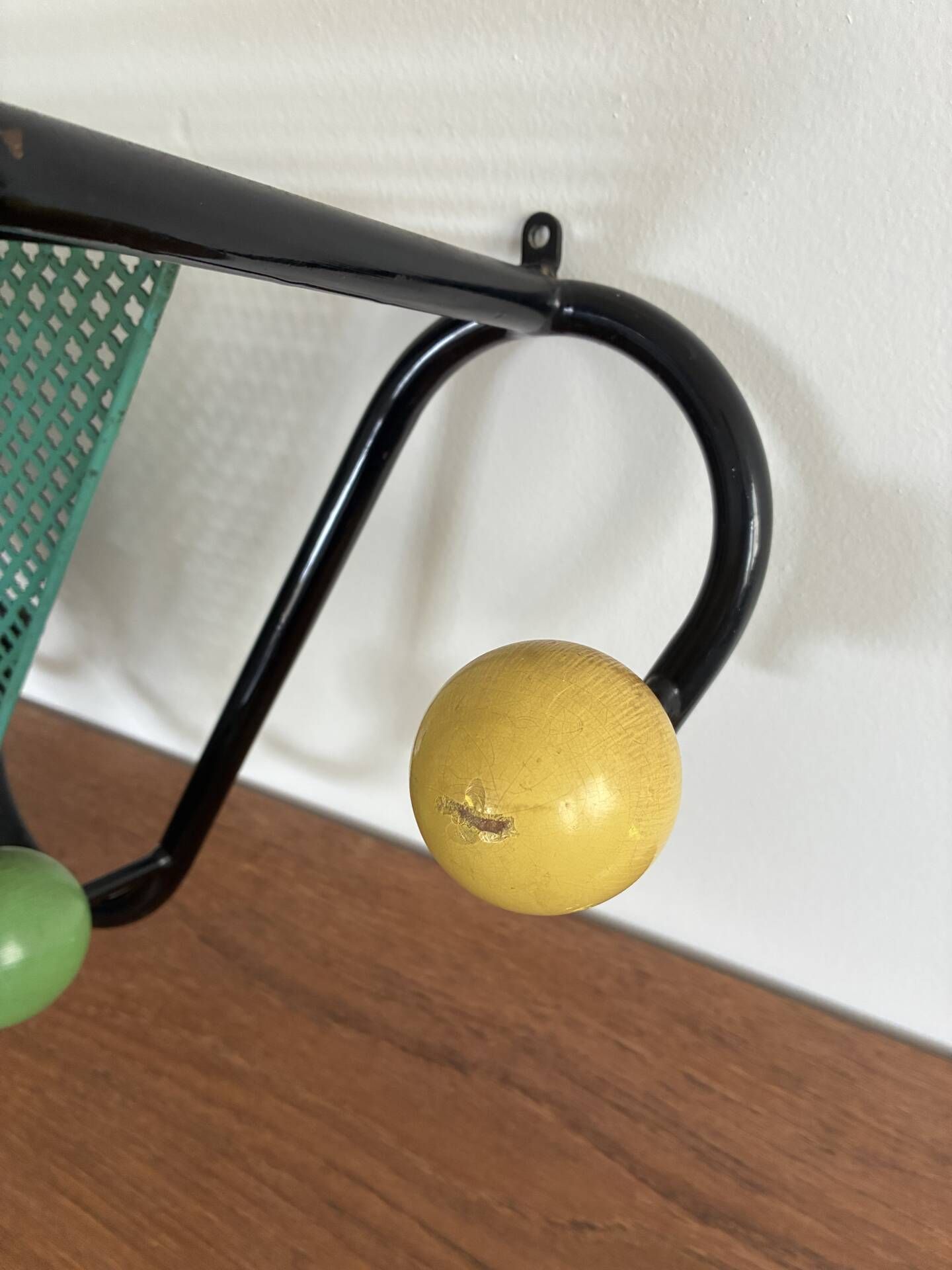 Vintage wall coat rack from the 1950s.