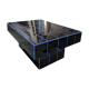 Black tiled coffee table and midnight blue grout