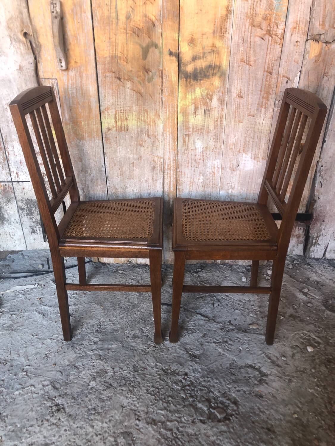 Pair of art deco chairs in wood & cane seat