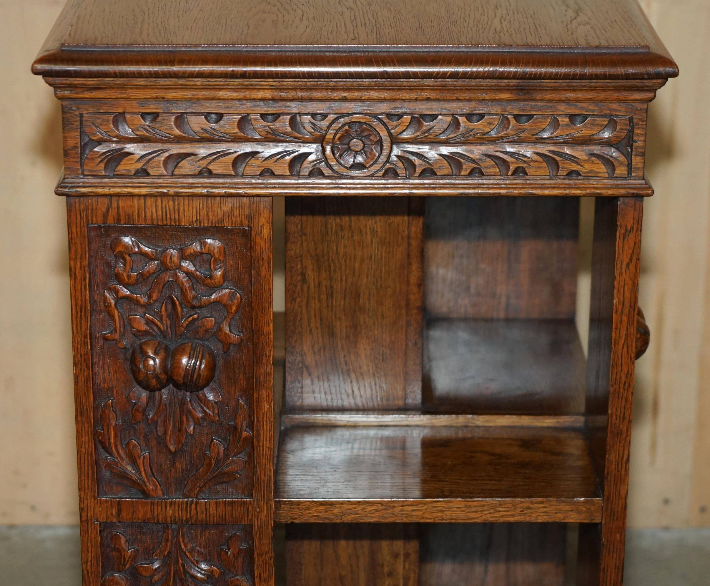 Victorian carved oak revolving library, circa 1880.