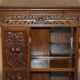 Victorian carved oak revolving library, circa 1880.