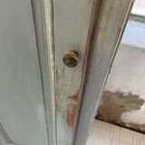 Blue patinated cap cabinet