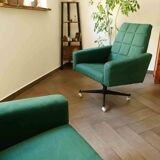 Pair of retro swivel chairs on casters