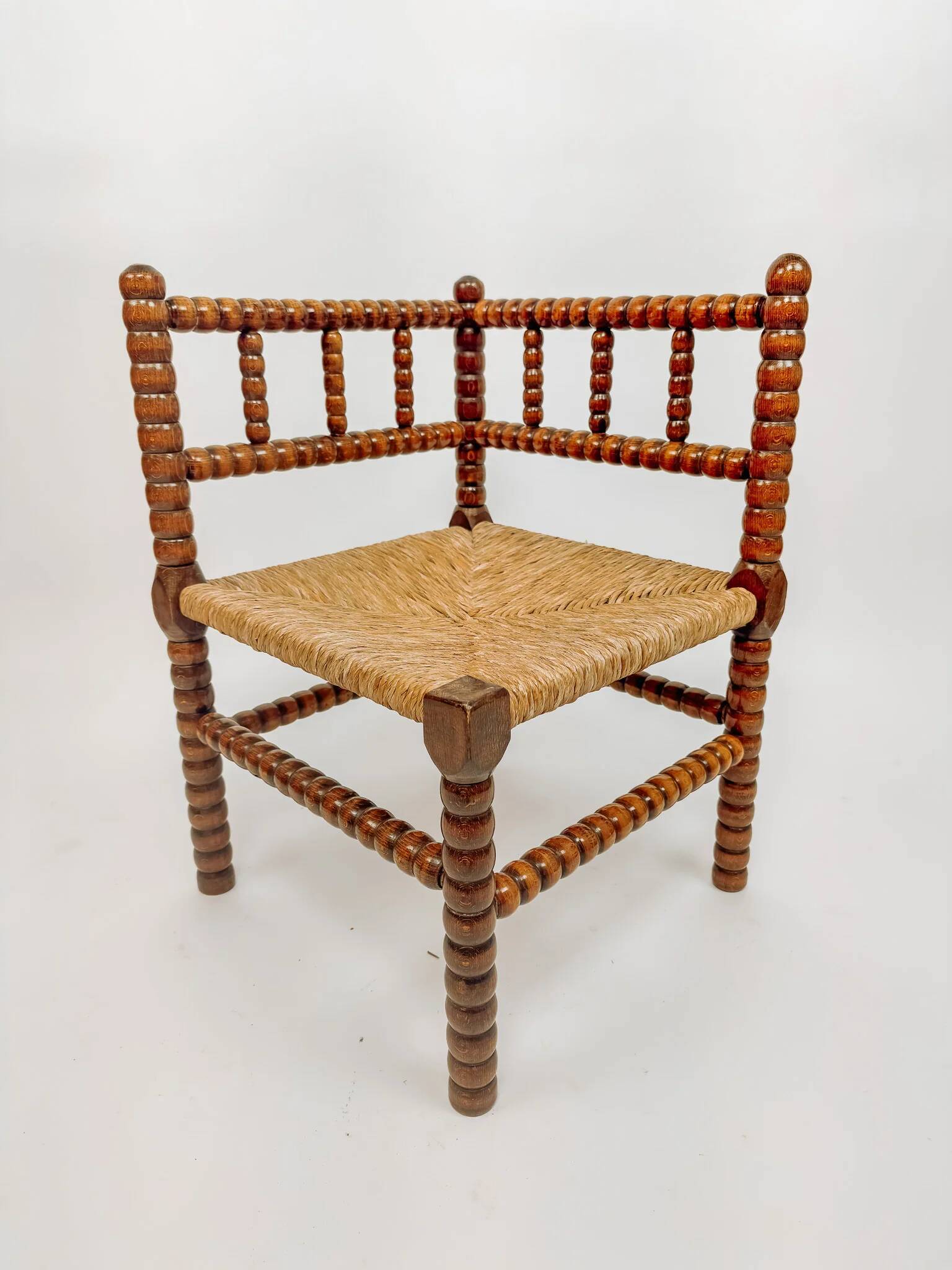 Classic vintage bobbin corner armchair