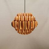Copper colored hanging lamp. designed by thorsten orrling sweden