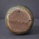 Wabi-sabi artisanal stoneware vase in green and earth tones.