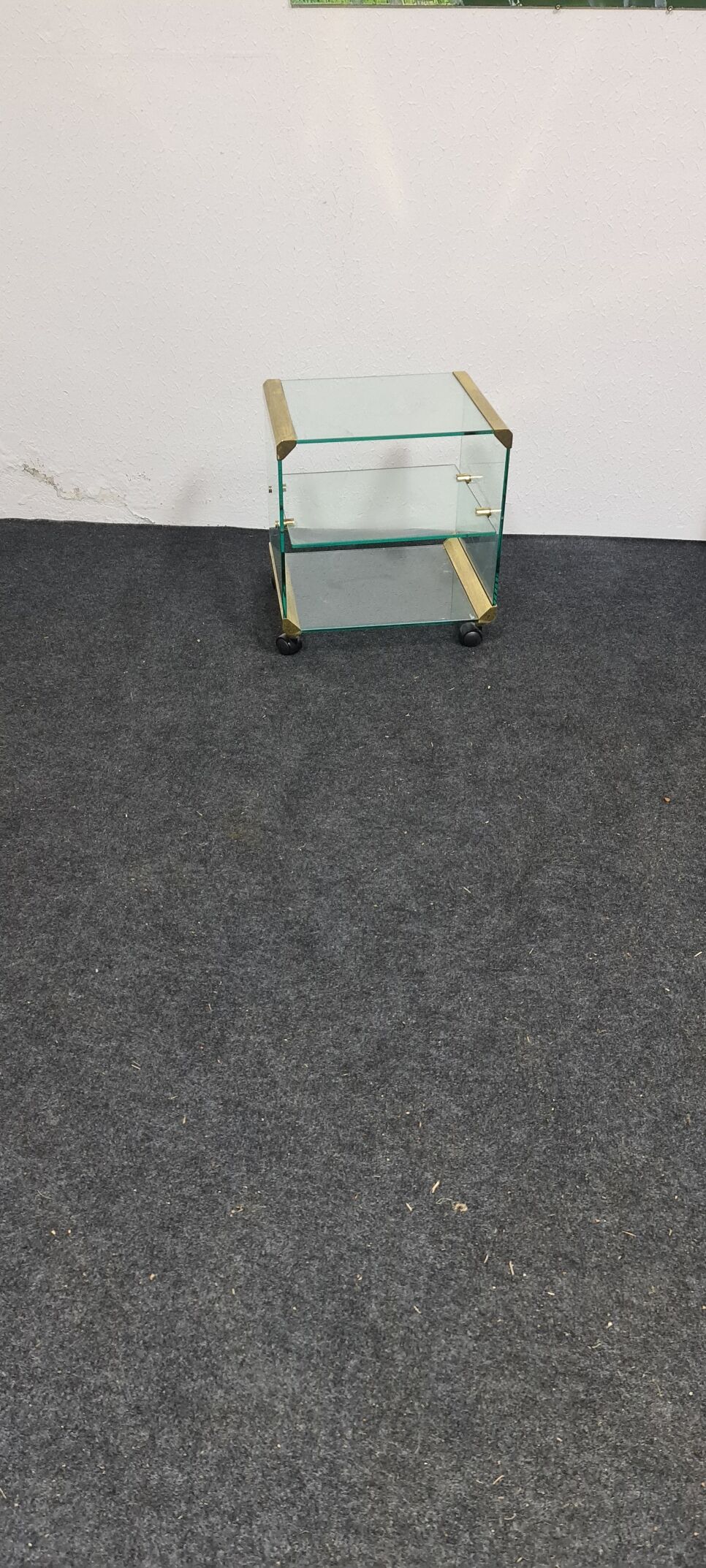 Vintage glass sidetable on wheels