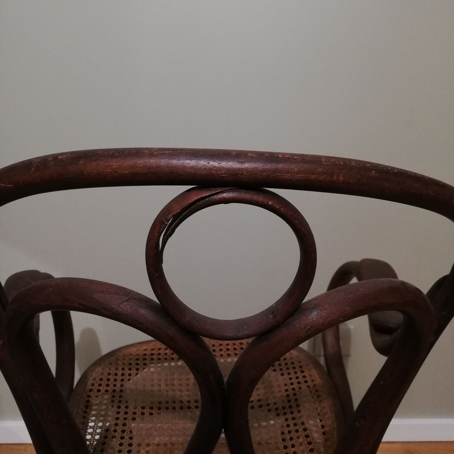 Canned armchair in curved wood signed J.Kohn