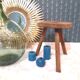 Raw wooden tripod stool
