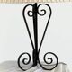 Vintage wrought iron table lamp in swirl shape with pleated shade