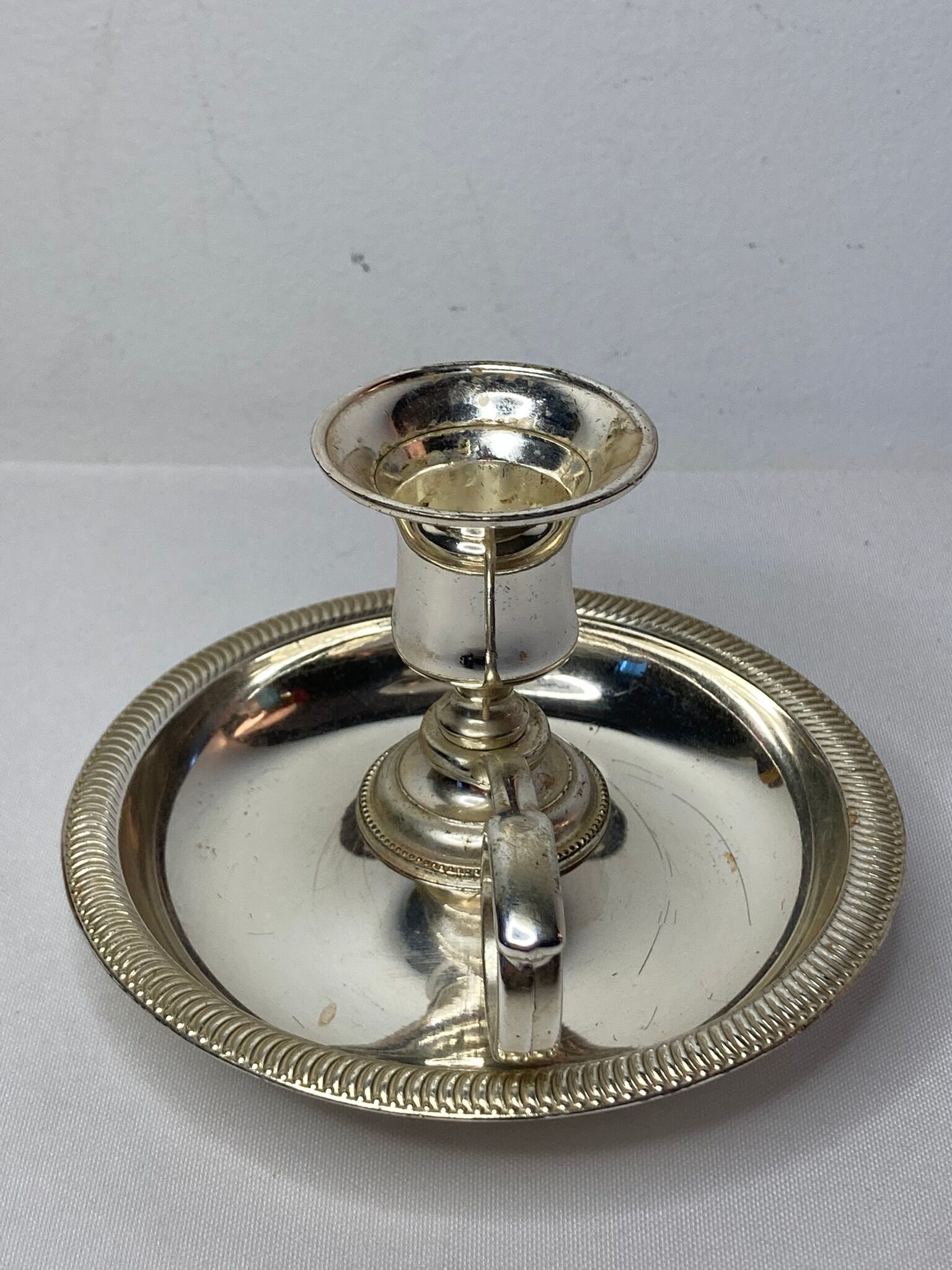 Twentieth century silver metal hand candle holder