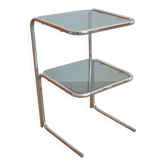 Glass-topped side table with tubular metal.