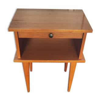 Old vintage bedside table with a scandinavian drawer