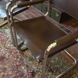 Leather and steel armchairs