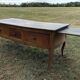 Antique Louis XV paneled table with 3 front drawers in solid cherry wood