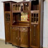 Art Nouveau mahogany buffet with clock in the style of G. Serrurier Bovy.