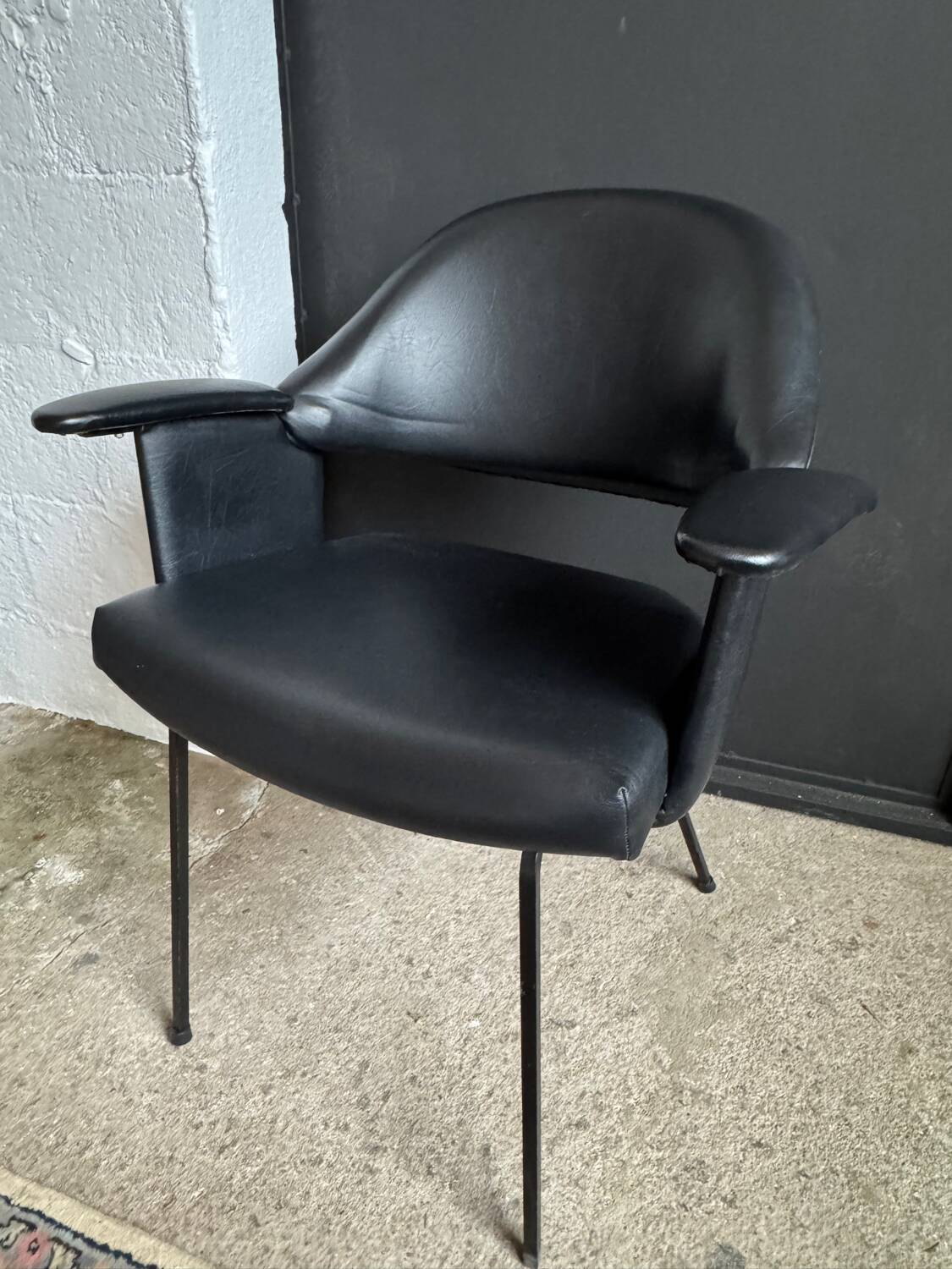 Black armchair from the 1950s