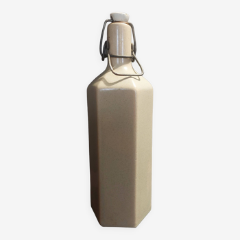 20th century glazed stoneware bottle, stork brand