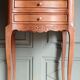 Curved fruitwood chiffonnier in Louis XV style.