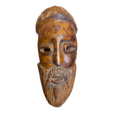 Moroccan mask in carved wood vintage decoration