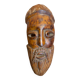 Moroccan mask in carved wood vintage decoration
