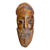 Moroccan mask in carved wood vintage decoration