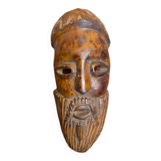 Moroccan mask in carved wood vintage decoration