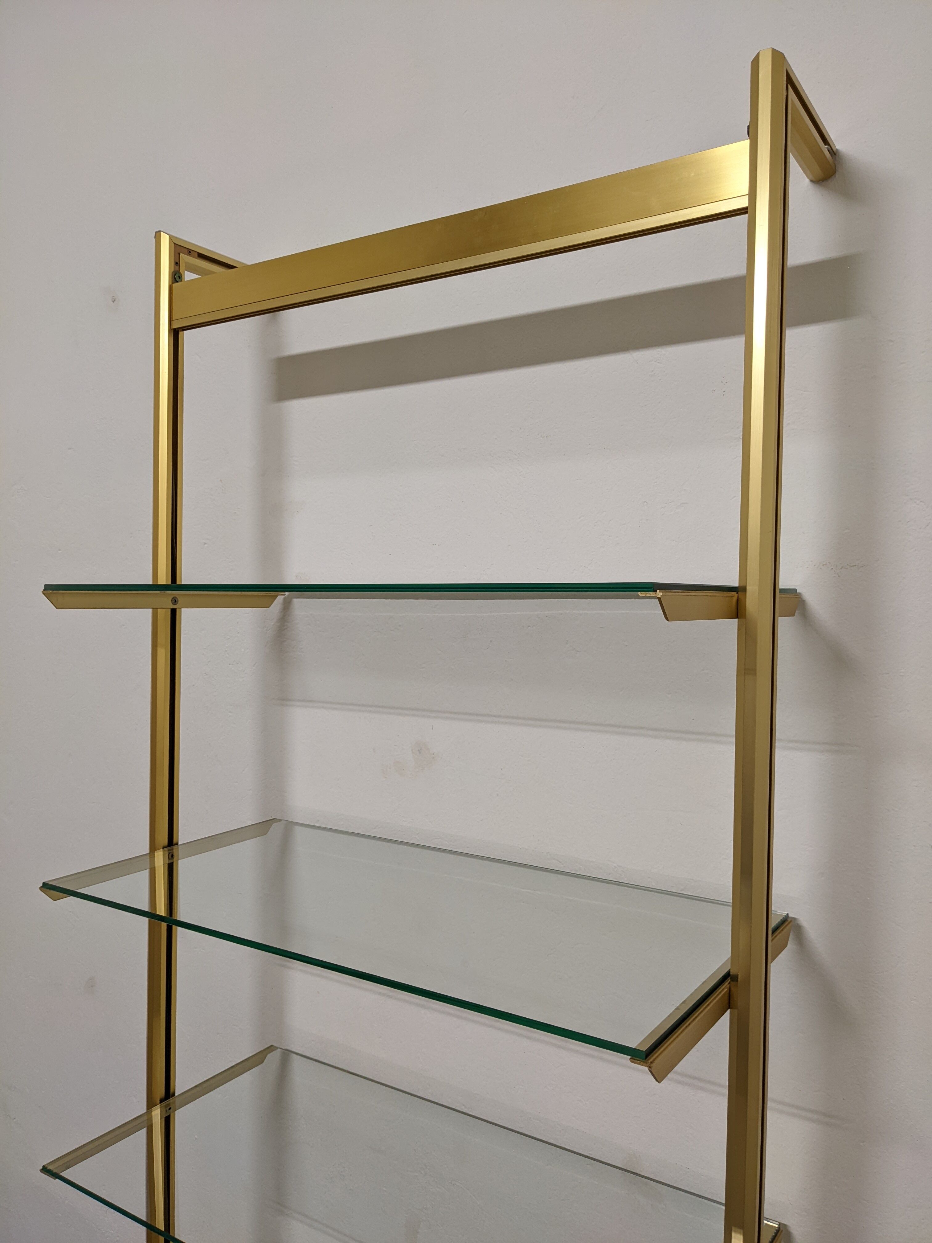 Modular shelf in glass and gilded aluminum from the 70-80s