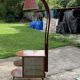 Art Deco brown walnut cocktail bar cabinet with integrated lamp and mirrored display 1950s