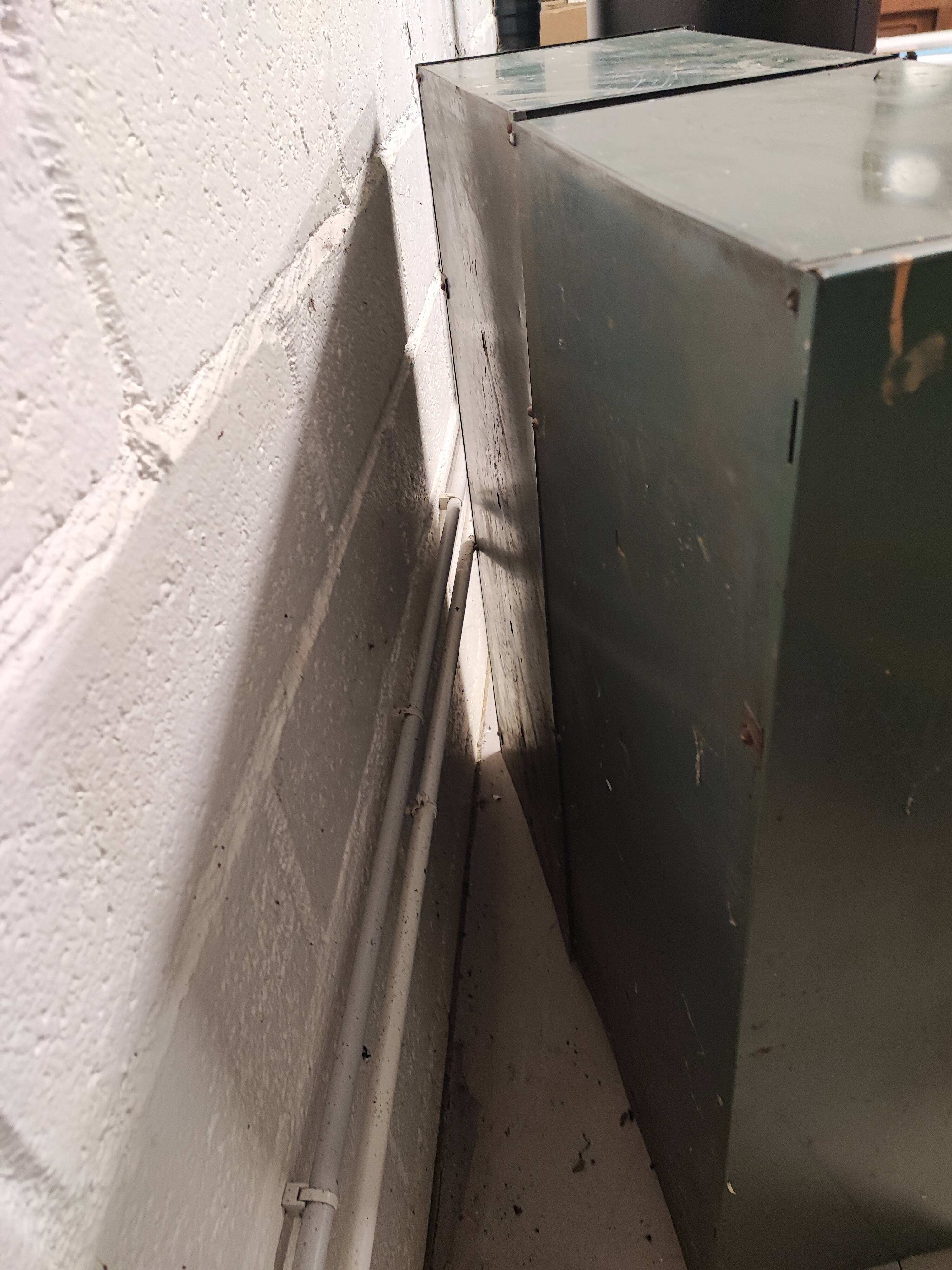 10-compartment metal locker with hinged door from the 50s