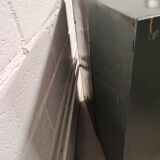 10-compartment metal locker with hinged door from the 50s