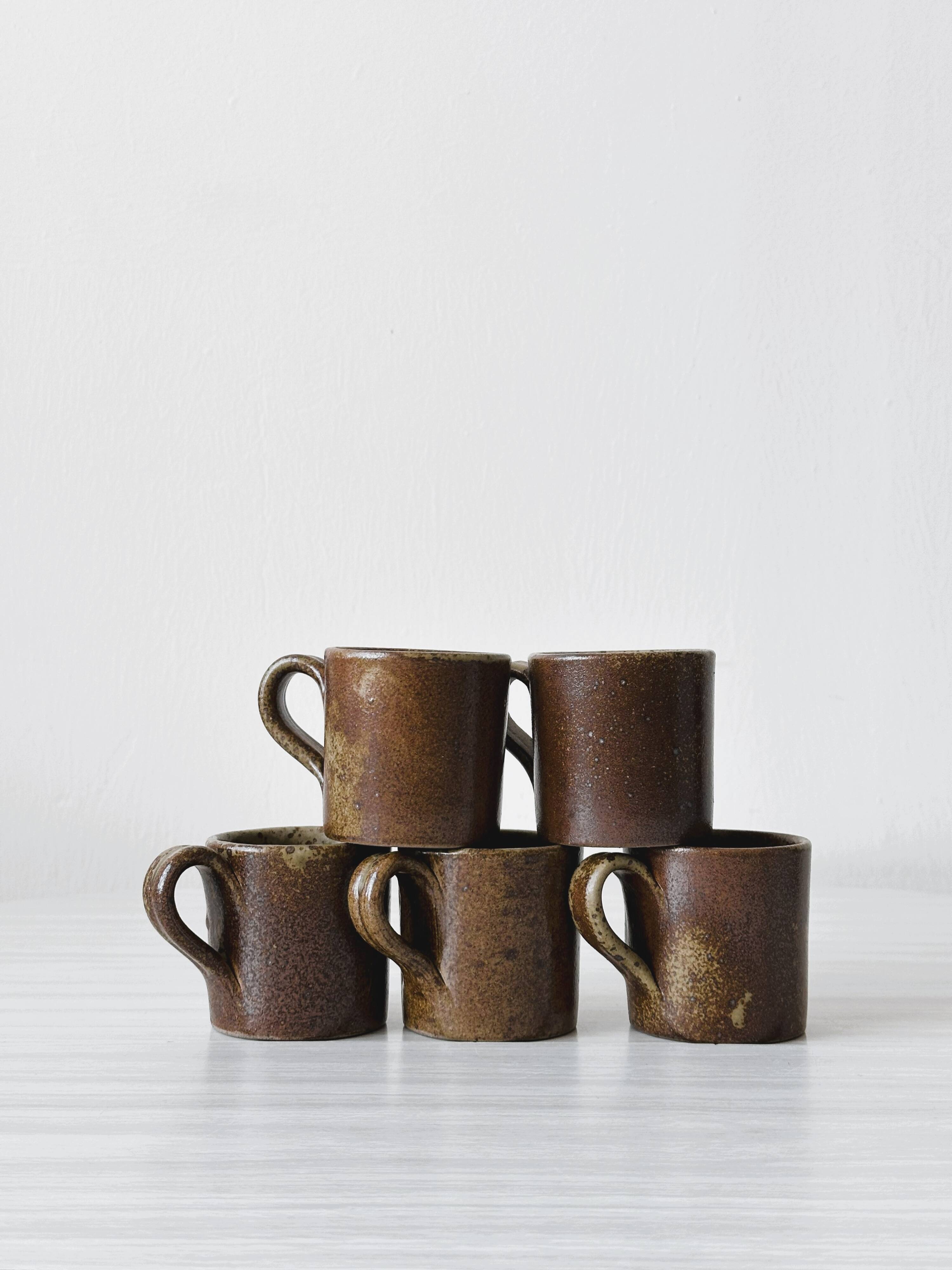 Artisanal pyrite-colored stoneware mugs