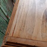 Antique wooden desk with a patinated base