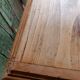 Antique wooden desk with a patinated base