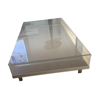 Italian designer coffee table in wood, glass, and metal.