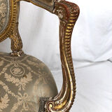 Carved and gilded wooden armchair in Louis XVI style, circa 1900