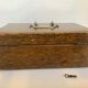 Old wooden box with handle and metal keys