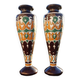 pair of old vases with art deco motifs