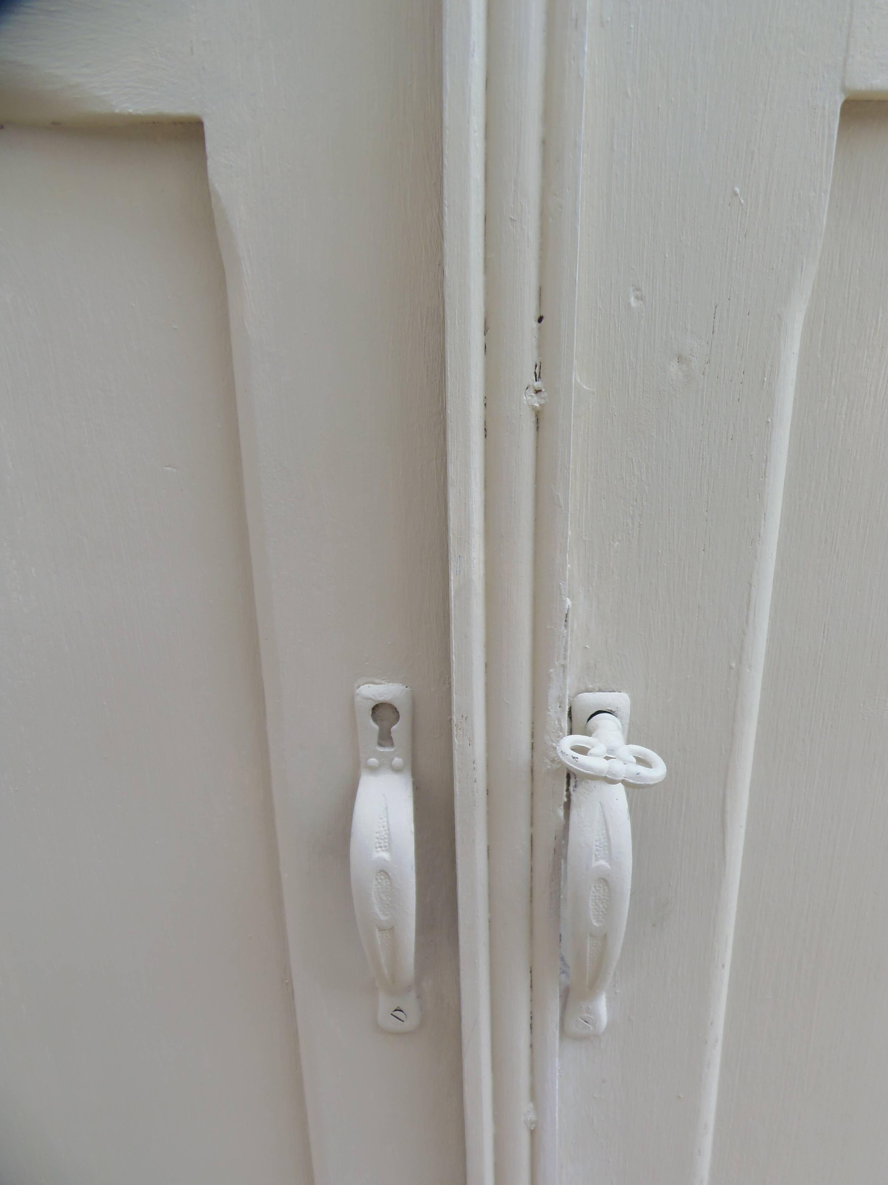 Re-enchanted Art Deco wardrobe in beige.