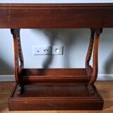 Pedestal table with lyre legs