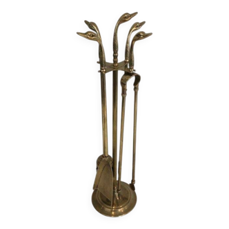 Fire necessary for the brass duck heads in the style of Maison Jansen.