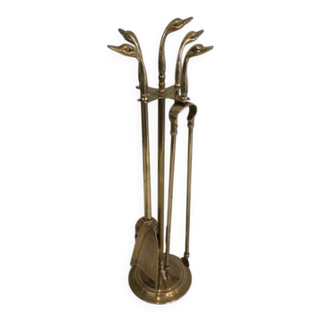 Fire necessary for the brass duck heads in the style of Maison Jansen.