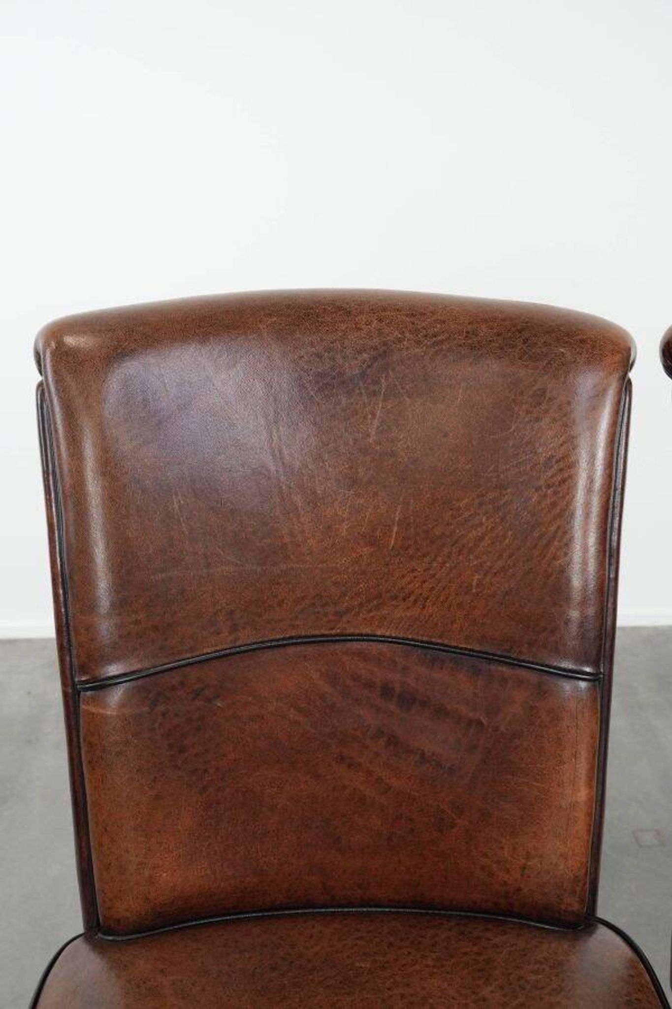 Comfortable set of 2 sheep leather dining chairs with character