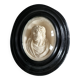 Ancient religious medallion, Jesus Christ in plaster with a blackened wooden frame.